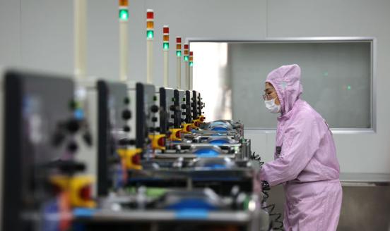 An employee works at a semiconductor production line on April 1, 2024 in Binzhou, Shandong Province of China. (Photo by VCG/VCG via Getty Images)
